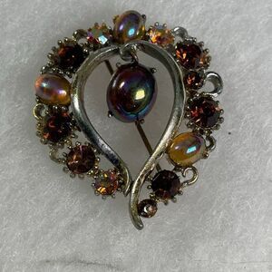 VTG Lisner faux Amber colored dangle cabochon brooch.